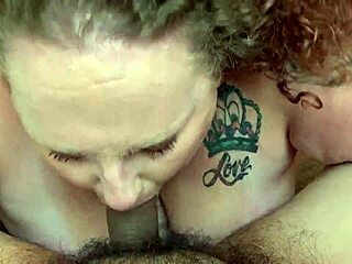 American busty wife gets down on her knees and sucks a big cock