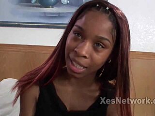 Petite teen gives a petite blowjob in black girl amateur video