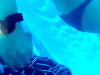 Amateur couple enjoys pool sex with handjob and cumshot