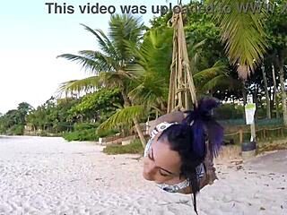Shibari bondage on a public beach with Lordshibarifloripa and Joy Cardozo