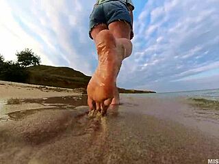 Explore the sensual world of foot fetishism on a sun-kissed beach
