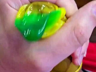 Bisexual nerd gets a handjob with condom in amateur video