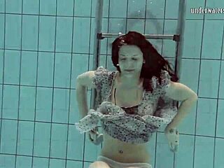 European beauty Loris Licicia's sizzling pool scene