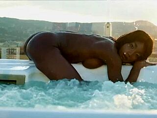 ebony beauty mimi desuka strips naked by cameroon pool for playboy shoot