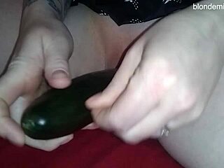 Amateur milf enjoys cucumber penetration