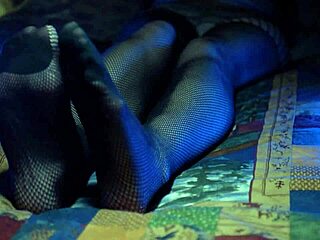 Sexy housewife's toes peeking through fishnets in amateur video