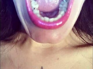 Seductive video for those with a fetish for oral stimulation, featuring a gorgeous woman engaging in dirty talk
