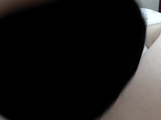 A close-up view of a thin African American teenager giving oral pleasure