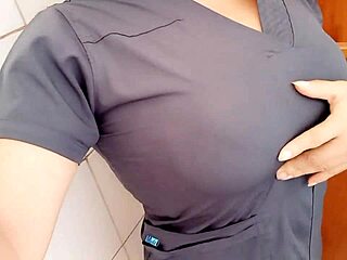 A professional woman of mature age indulges in erotic activities at her workplace during her boss's absence on a business trip.
