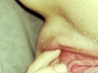 It feels so good to rub my bald and shaven pussy under the covers to get the ultimate orgasm.