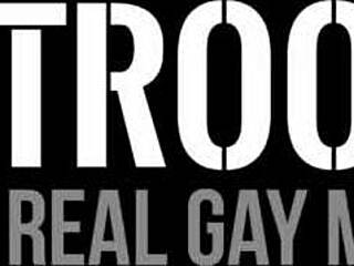 Soldiers engage in anal sex outdoors in a group