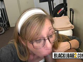A blonde teen with glasses likes to have rough anal sex with black men on a sofa.