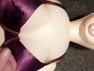 Dolly the blow up sex doll enjoys a fun filled handjob session
