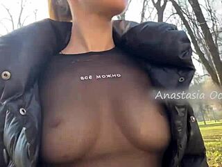 Beautiful blonde, amateur, flashes her big boobs in a public park