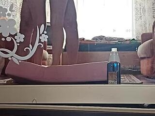 An Asian couple from Kazakhstan having sex in a home video