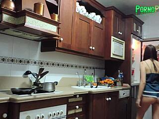 Beautiful girlfriend seduces her partner in the kitchen