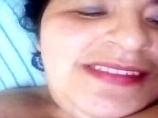 A video call with a plus size woman showing her breasts and vagina