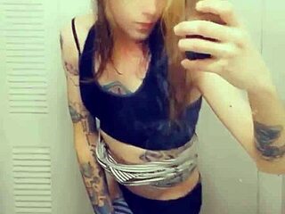 Pretty shemale in miniskirt masturbates and shows her small penis