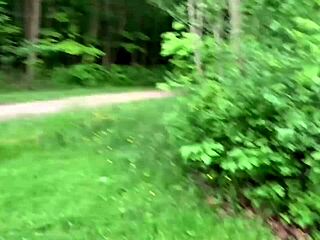 Beautiful woman gives blow job to big black cock in the park