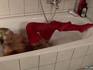 A young German woman in stockings gives a perfect blow job in the bath tub