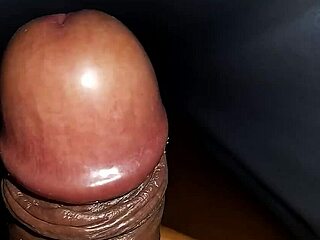 Black cock spewing while stroking off
