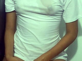 College girl in a wet t-shirt, teasing and showing off
