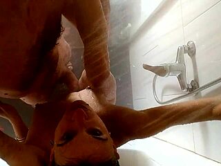 A big cock gets a hot shower with cum in mouth and doggystyle action