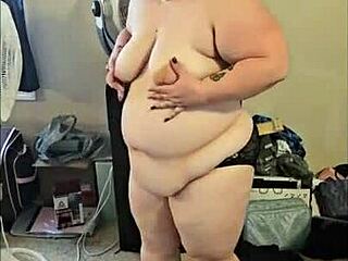 A striptease dance routine by a brunette MILF