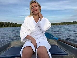 Amateur couple enjoys hot outdoor sex on the lake in a boat