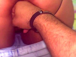 A bi-sexual couple enjoys a happy ending in this porn video