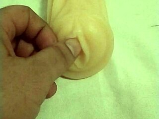 Toying with a realistic vagina