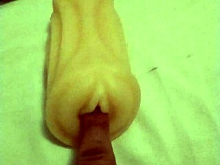 Toying with a realistic vagina
