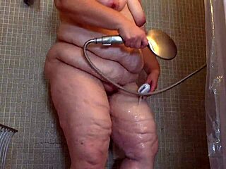 Steamy shower time with a big-boobed, fat MILF