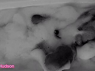Kity Hudson takes a bath and plays with a toy