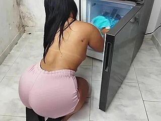 A housewife is looking for fruits in front of the camera