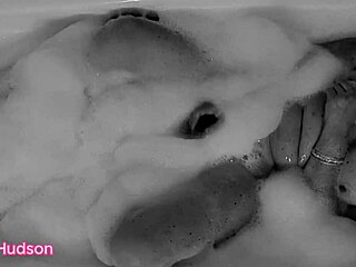 Kity Hudson takes a bath and plays with a toy